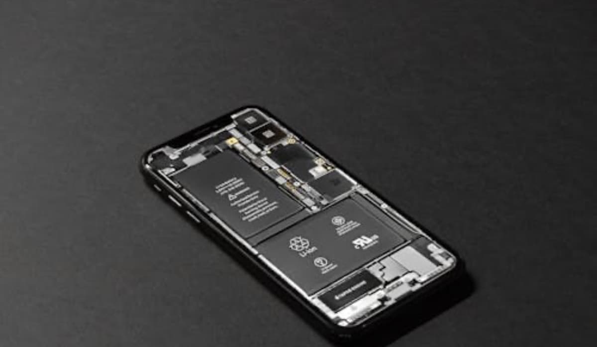 Professional phone repair showing internal components